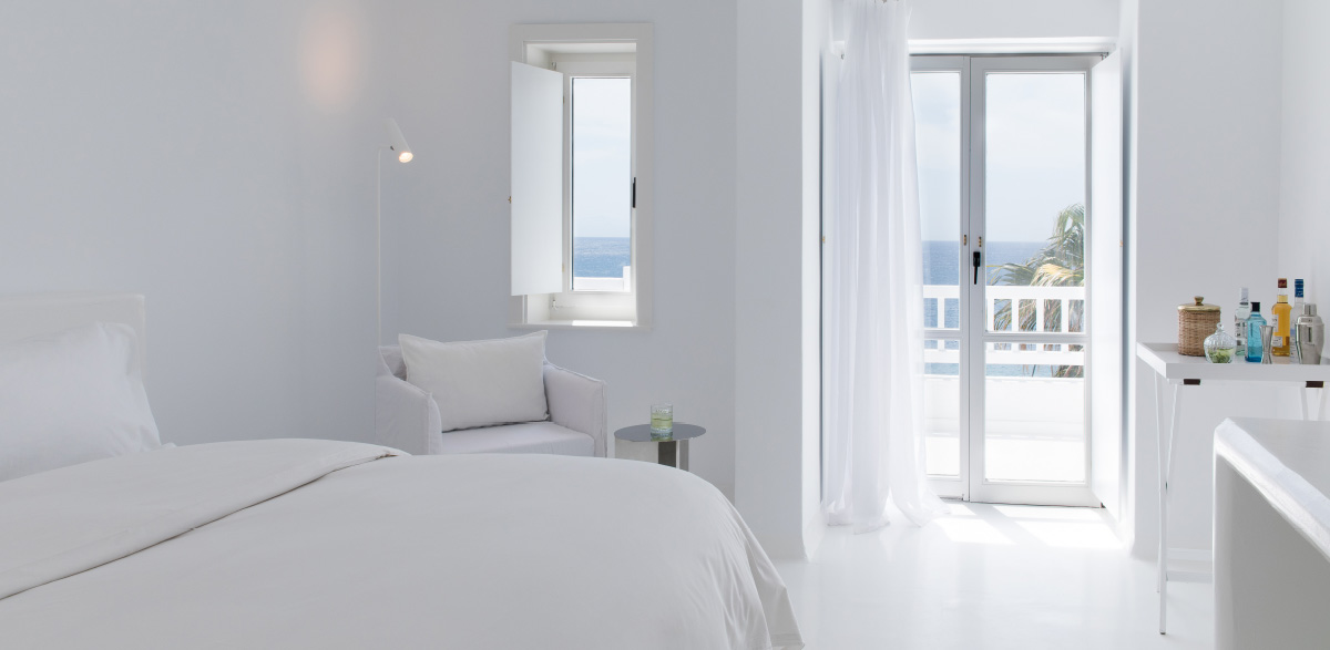 01a-bedroom-island-bungalow-deluxe-mykonos-blu-grecotel